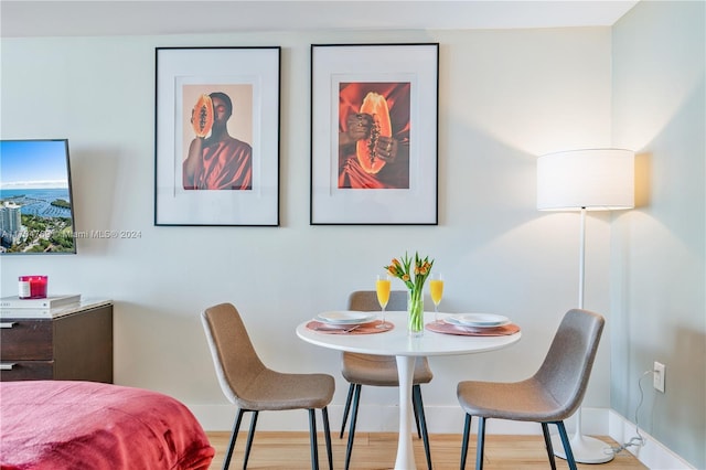 dining room with light hardwood / wood-style floors