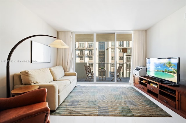 living room featuring floor to ceiling windows