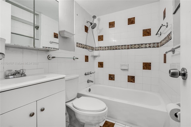 full bathroom featuring vanity, decorative backsplash, tiled shower / bath combo, toilet, and tile walls