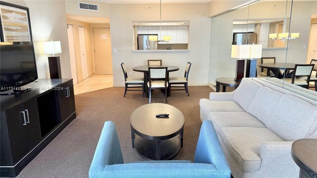 17375 Collins Ave Unit 2406, Sunny Isles Beach, FL 33160 - living room with carpet and baseboards