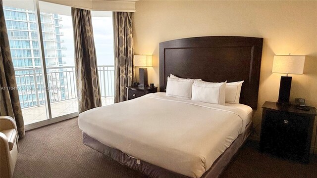 17375 Collins Ave Unit 2406, Sunny Isles Beach, FL 33160 - bedroom featuring access to exterior and carpet floors