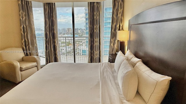 17375 Collins Ave Unit 2406, Sunny Isles Beach, FL 33160 - bedroom featuring access to outside and a city view