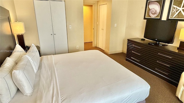 17375 Collins Ave Unit 2406, Sunny Isles Beach, FL 33160 - carpeted bedroom featuring a closet and baseboards