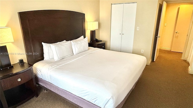 17375 Collins Ave Unit 2406, Sunny Isles Beach, FL 33160 - carpeted bedroom featuring a closet and baseboards