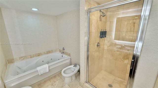 bathroom with tile patterned flooring, shower with separate bathtub, and a bidet