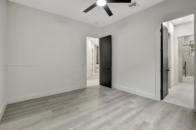 unfurnished bedroom with ceiling fan and light hardwood / wood-style flooring