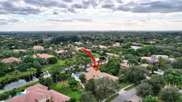 birds eye view of property featuring a water view