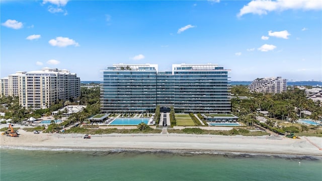 bird's eye view with a beach view and a water view