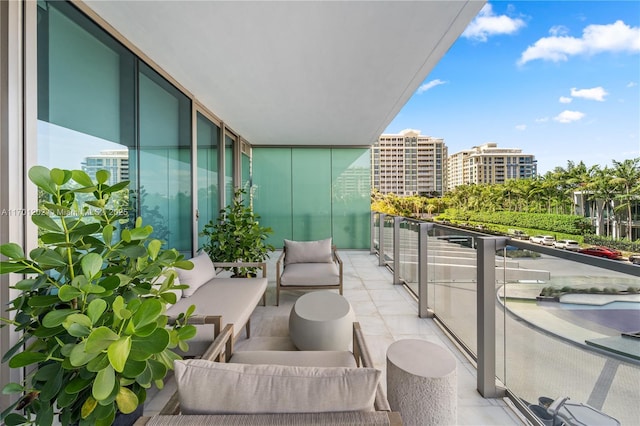 balcony featuring a city view