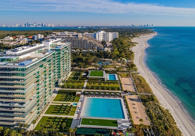 bird's eye view featuring a view of city, a beach view, and a water view