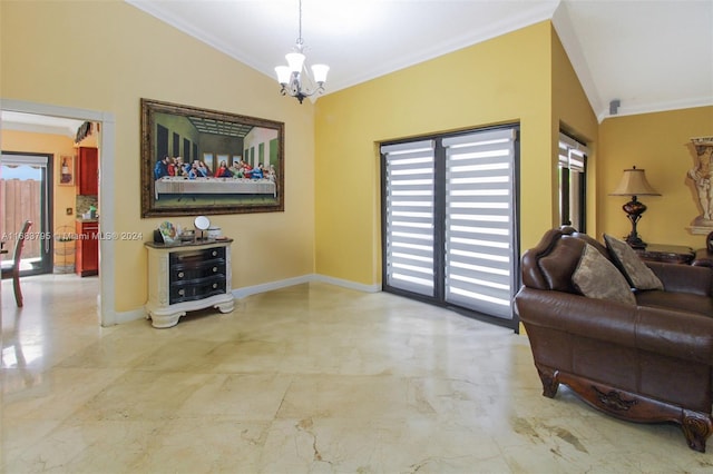 living room featuring an inviting chandelier, lofted ceiling, and ornamental molding