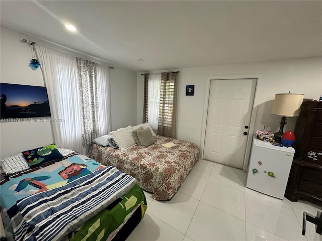 bedroom featuring light tile patterned floors