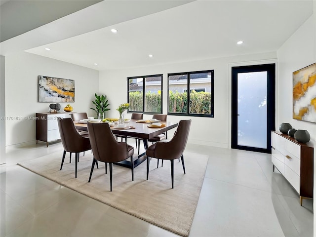 dining space with light tile patterned floors