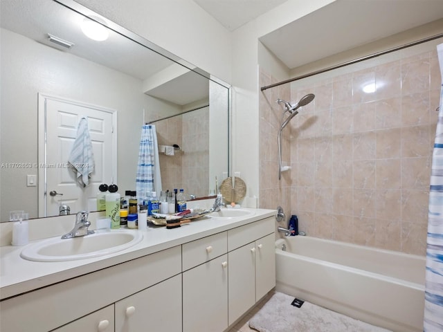 bathroom with vanity and shower / bathtub combination with curtain