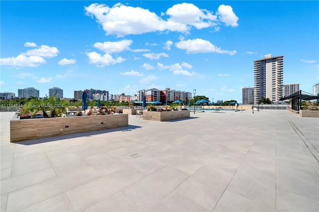 view of home's community featuring a patio area