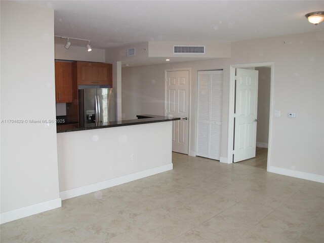 kitchen with stainless steel fridge