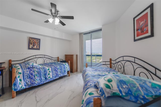 bedroom with floor to ceiling windows and ceiling fan