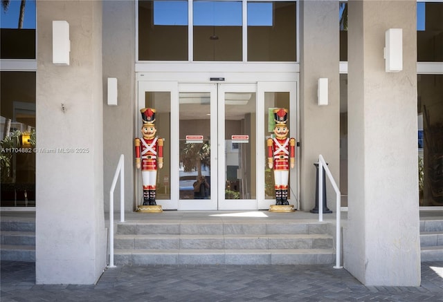 entrance to property featuring french doors