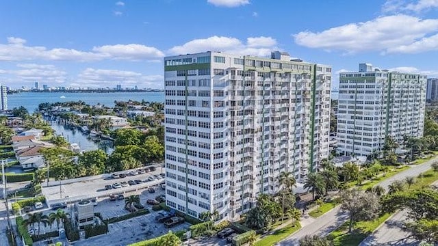 view of property with a city view and a water view