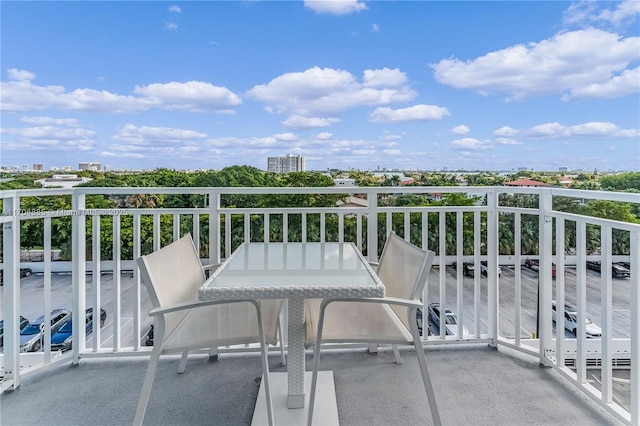 balcony featuring outdoor dining area