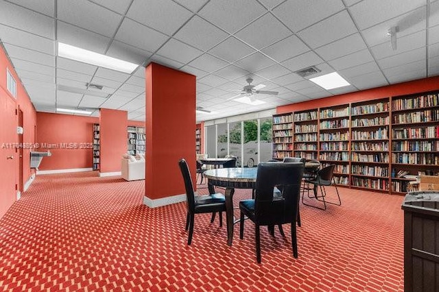 dining area featuring carpet, visible vents, and baseboards