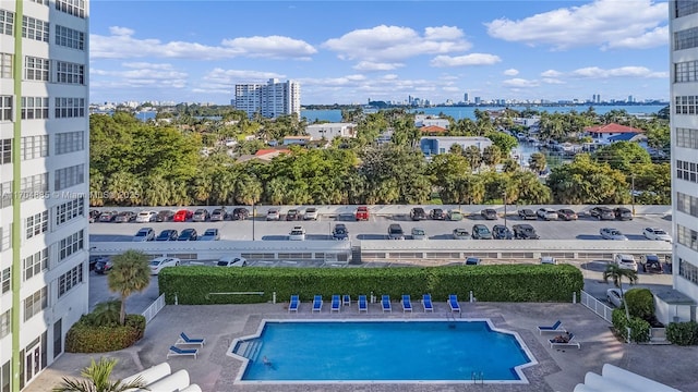 community pool featuring a city view