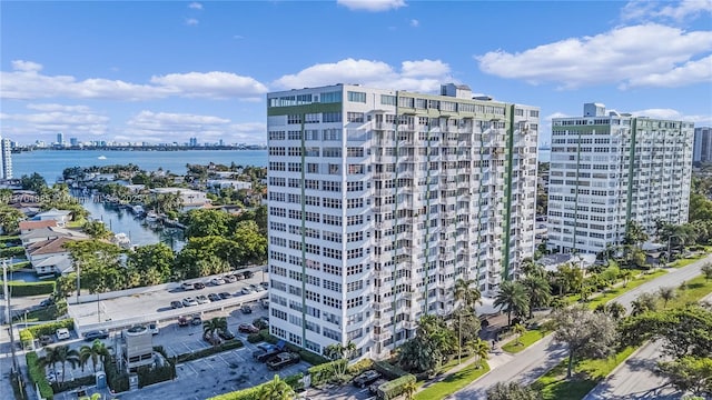 view of property featuring a water view and a city view