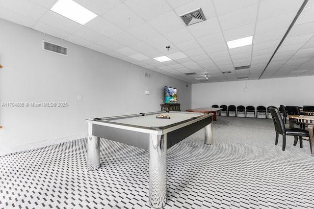 recreation room featuring a paneled ceiling and visible vents