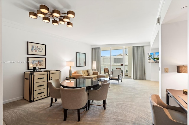 carpeted dining area with expansive windows and ornamental molding