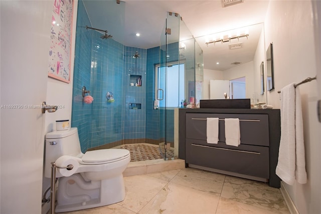 bathroom with vanity, toilet, and walk in shower