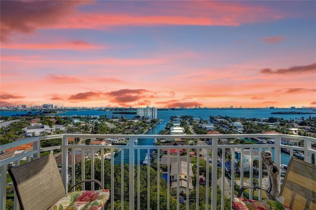 balcony at dusk with a water view