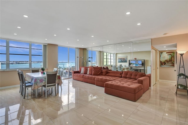 living room featuring a water view