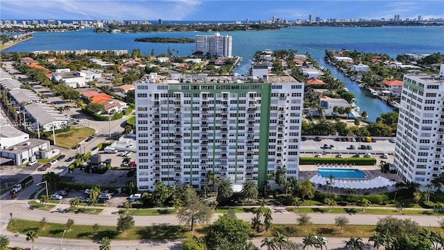 birds eye view of property with a water view