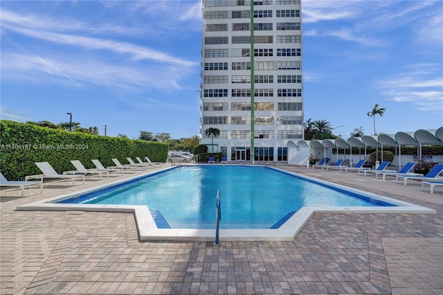 view of swimming pool featuring a patio area