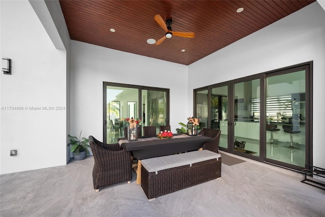 view of patio featuring ceiling fan