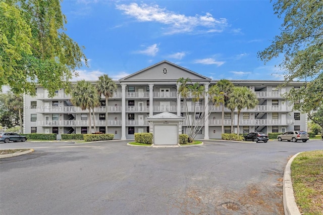 1530 Whitehall Dr Unit 204, Davie, FL 33324 - view of building exterior featuring uncovered parking