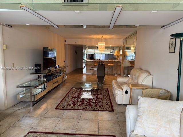 1530 Whitehall Dr Unit 204, Davie, FL 33324 - living room with tile patterned flooring