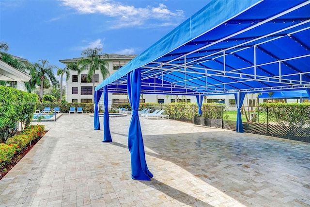 1530 Whitehall Dr Unit 204, Davie, FL 33324 - view of patio featuring fence