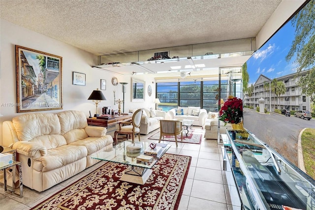 tiled living room with a textured ceiling