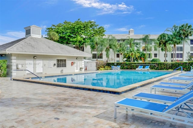 view of pool featuring a patio area