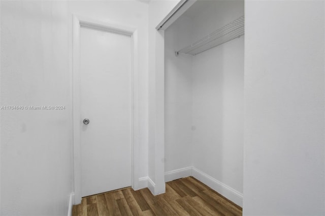 spacious closet with wood finished floors