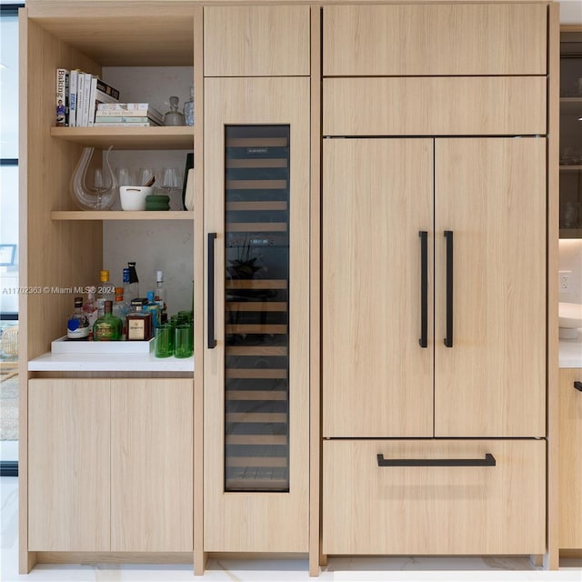 pantry featuring beverage cooler