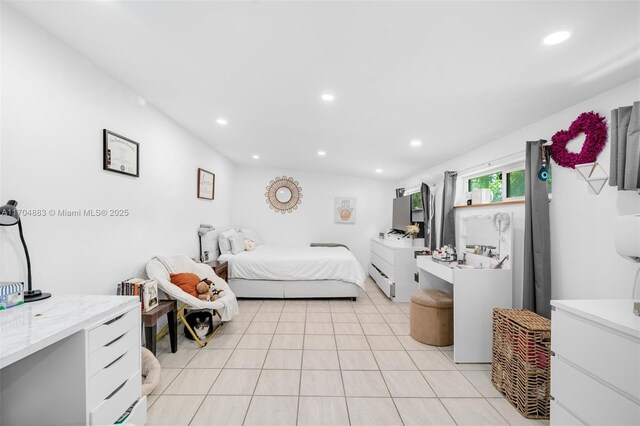 tiled bedroom featuring ceiling fan, beam ceiling, and an AC wall unit