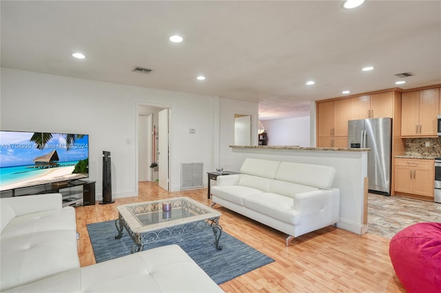 living room featuring light hardwood / wood-style floors