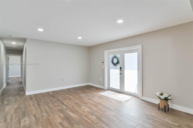 entrance foyer featuring light hardwood / wood-style floors