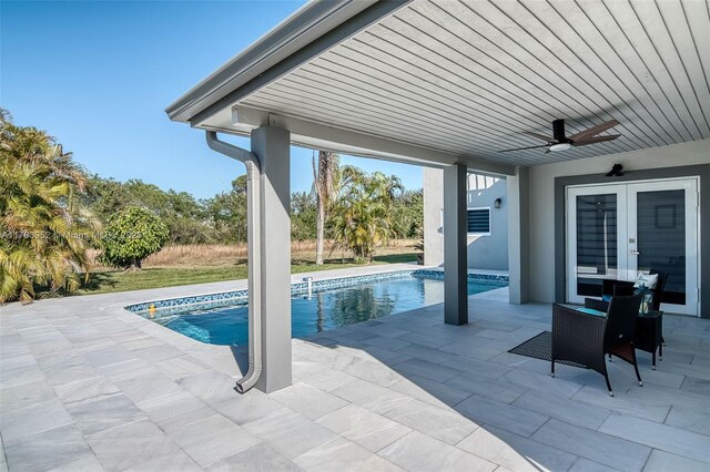 19450 SW 125th Ave, Miami, FL 33177 - swimming pool featuring a patio, french doors, and a ceiling fan