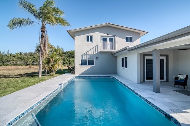 view of pool with a patio area