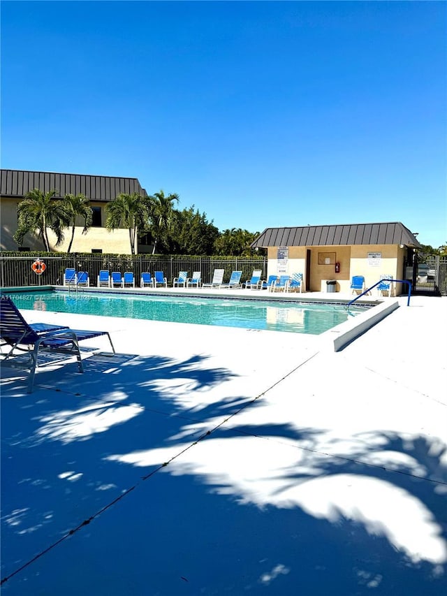 137 NW 93rd Ave Unit 103, Pembroke Pines, FL 33024 - community pool with a patio