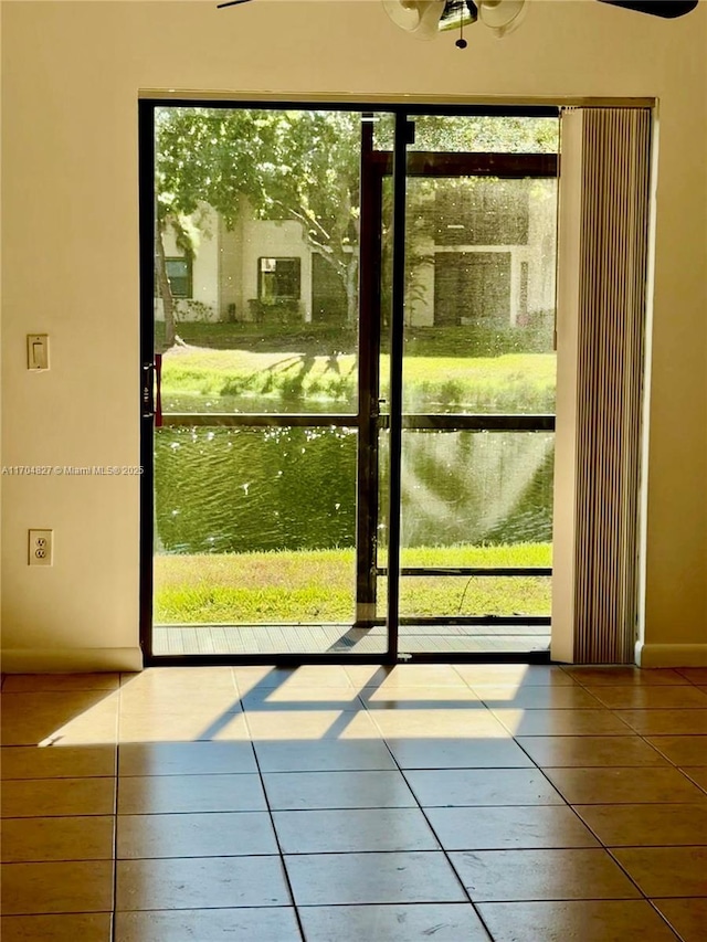 137 NW 93rd Ave Unit 103, Pembroke Pines, FL 33024 - doorway to outside with tile patterned floors