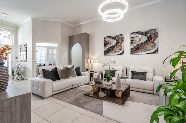 tiled living room featuring an inviting chandelier and ornamental molding